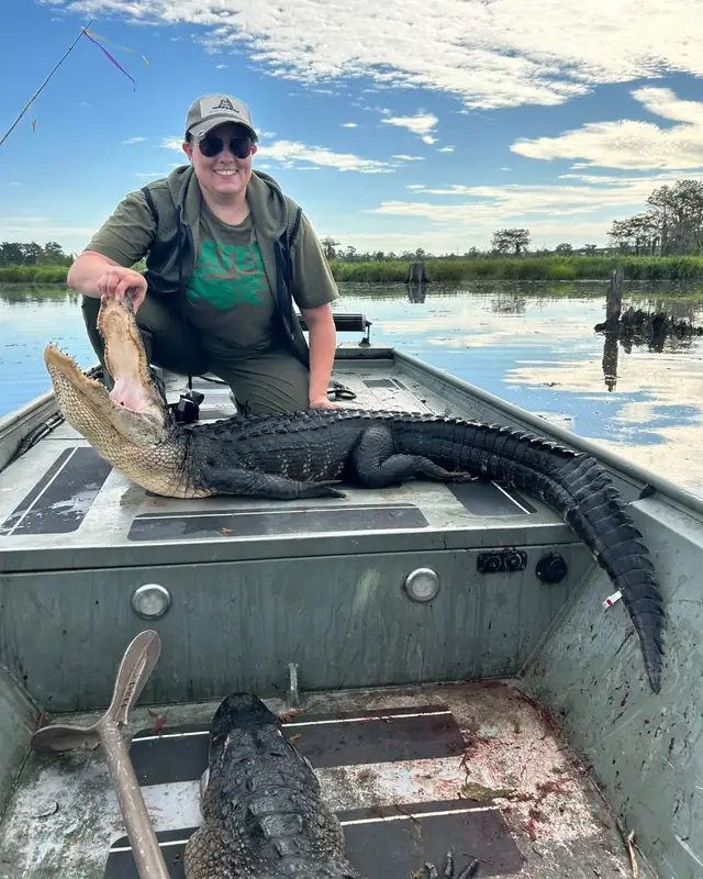 Hunter on the Louisiana marsh at sunset during an alligator hunt